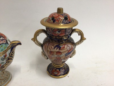 Lot 670 - Early 19th century Masons Ironstone Imari wares, including a twin handled vase, dessert tureen, mug, smaller vase, two spill vases and a miniature teapot, various marks, the large vase unmarked and...