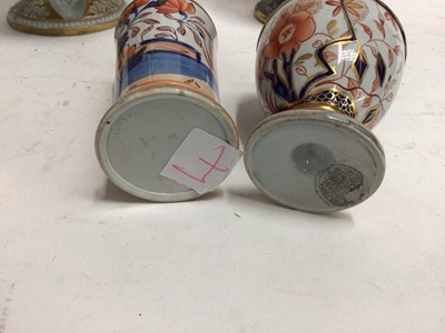 Lot 670 - Early 19th century Masons Ironstone Imari wares, including a twin handled vase, dessert tureen, mug, smaller vase, two spill vases and a miniature teapot, various marks, the large vase unmarked and...