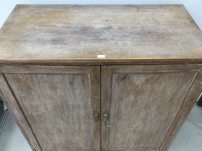 Lot 38 - Three Heals limed oak 'Tilden' chairs, each with drop-in seats and makers plaques, together with a similar dining table, 152cm x 76cm (unmarked) and a similar two door cupboard, lacking shelves, 12...