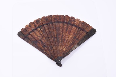 Lot 795 - Fine 19th century Chinese export carved tortoishell fan with finely pierced figure and landscape decoration , opening to 33 cm wide  19 cm high.