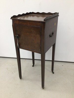 Lot 138 - 19th century mahogany pot cupboard with ledge back above a single door on square legs terminating on brass castors, 37cm square