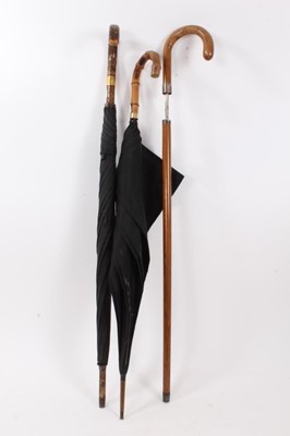 Lot 807 - Edwardian sword stick with rectangular tapered blade and two 1930s umbrellas (3)