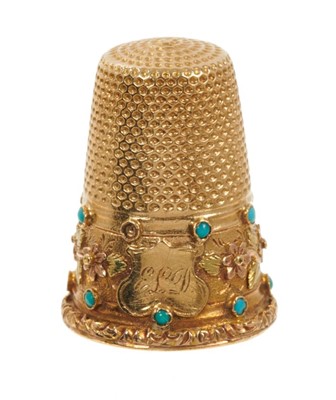 Lot 453 - Victorian gold thimble with a three-colour gold floral and turquoise band, in original leather case.