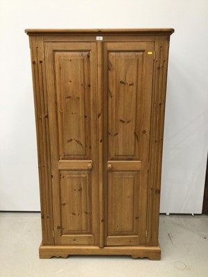 Lot 99 - Modern pine dwarf double wardrobe with two...