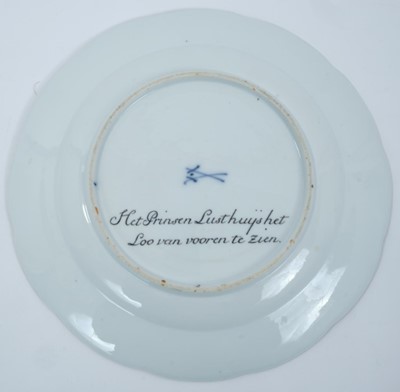 Lot 172 - A Meissen plate from the Stadhouder William V service, circa 1772-74, blue crossed swords and dot mark, the centre painted with a view of 'Het Prinsen Lusthuys het Loo van vooren te zien', titled o...