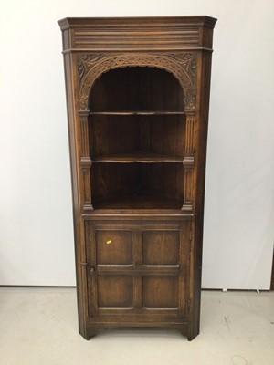 Lot 176 - Carved oak corner cabinet H180, W79, D42cm