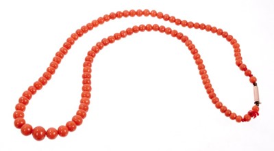 Lot 478 - Antique coral bead necklace with a string of graduated coral beads measuring approximately 8.2mm to 4.1mm, on a barrel clasp. Length approximately 46cm.