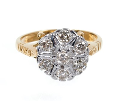 Lot 497 - Diamond cluster ring with a star shape design of seven brilliant cut diamonds in white gold setting on 18ct yellow gold setting. Estimated total diamond weight approximately 0.50cts. Finger size ap...