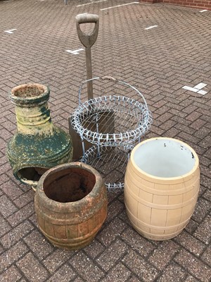 Lot 153 - Metal two tier plant stand, wooden shovel together with three other garden ornaments