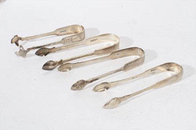 Lot 406 - Pair of George IV silver fiddle pattern sugar tongs, (London 1825), maker William Bateman, together with three other pairs of silver sugar tongs (various dates and makers), all at 8oz (4)