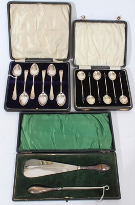 Lot 421 - Set of six George V silver coffee spoons in a velvet lined fitted case, (Sheffield 1910), together with as set of six George V silver bean end coffee spoons in a fitted case, (Birmingham 1931) and...