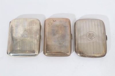 Lot 425 - George V silver cigarette case of domed rectangular form with reeded engine turned decoration, (Birmingham 1911) together with another similar cigarette case (Birmingham 1916) and another (Birmingh...