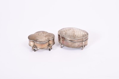 Lot 430 - Edwardian silver jewellery box, with engraved date to lid- 25th May 1905, raised on four feet, (Birmingham 1904), together with a George V silver jewellery box with engine turned decoration, (Chest...