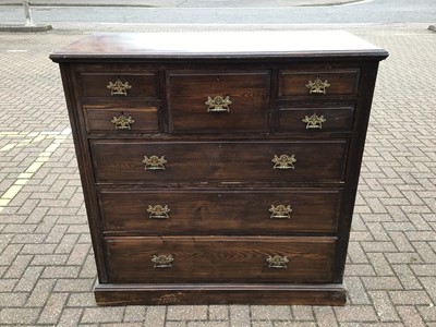 Lot 212 - Edwardian oak chest with central hat drawer flanked by four short drawers and three long graduated drawers below, 122cm wide, 53cm deep, 121cm high