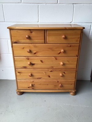 Lot 213 - Pine chest of two short and three long drawers, 81.5cm wide, 38cm deep, 74cm high together with another pine chest of two short and four long drawers, 90cm high