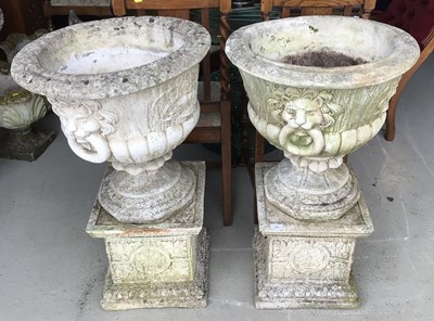 Lot 236 - Pair of concrete garden urns on square plinth bases, 95cm high, 53cm diameter