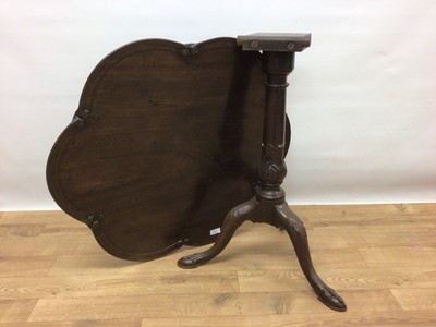 Lot 277 - George III and later mahogany tray top wine table on turned column and three hipped splayed legs, 69.5cm diameter