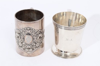 Lot 341 - Victorian silver christening mug of cylindrical form with embossed scroll decoration and one other
