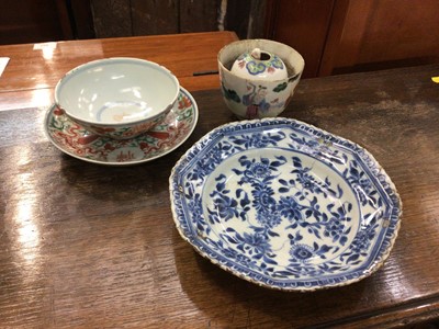 Lot 120 - Small collection of Chinese Qing period porcelain, including a 19th century famille rose novelty cup with hidden figure, a polychrome tea bowl and saucer, and a small Kangxi blue and white dish, 17...
