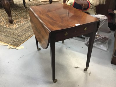 Lot 852 - George III mahogany oval pembroke table with two flaps and end drawer opening to 105 x 77 cm