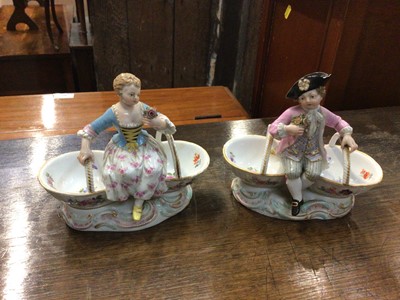 Lot 117 - Pair of 19th century Meissen porcelain baskets with figure mounts, blue crossed swords and impressed marks to base
