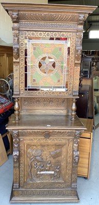 Lot 136 - 19th century Beligian carved oak two height dresser