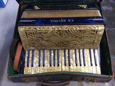 Lot 527 - Vintage La Divina accordion in case and records