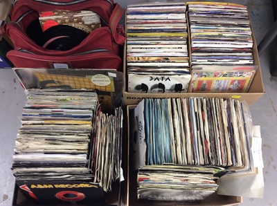 Lot 405 - Three boxes of single records including David Bowie, Police, Mission, Data, Pet Shop Boys, Men at Work, Maisonettes, Duran Duran, Dire Straits and Heaven 17, together with a red zip bag containing...
