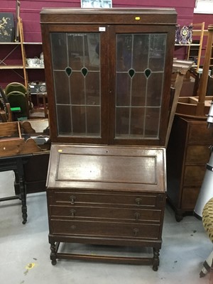 Lot 901 - 1930s oak bureau bookcase with tinted and leaded glazed doors