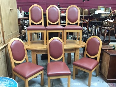 Lot 999 - Light oak dining table plus ten dining chairs