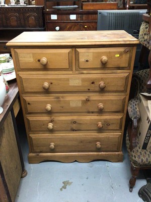 Lot 883 - Pine chest of 2 short and 4 long drawers, pair of pine three drawers bedside chests and a pine framed bevelled dressing mirror