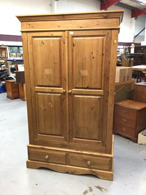 Lot 884 - Pine wardrobe with two panelled doors and two drawers