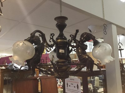 Lot 620 - Metal hanging ceiling light with glass shades, mounted with putti