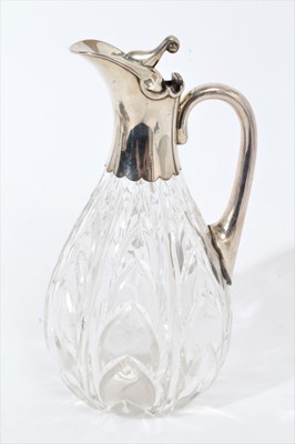 Lot 349 - Edwardian silver mounted cut glass claret jug, with leaf pattern decoration.