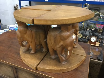 Lot 895 - Set of four occasional tables with carved Elephant decoration, forming one oval table, overall 33 x 55 x 46cm