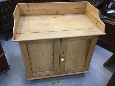 Lot 905 - Victorian pine washstand with ledge back and panelled doors with ceramic handle, 88 x 84 x 52cm