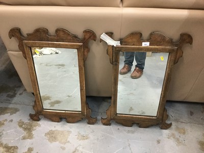 Lot 921 - Pair of Georgian style walnut fret carved wall mirrors, 72 x 50cm overall
