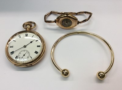 Lot 667 - Gold plated pocket watch with American Waltham USA Traveler movement, vintage gold plated wristwatch and a gold plated torque bangle