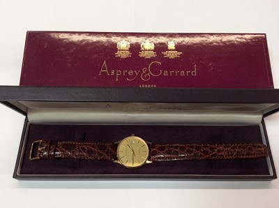 Lot 677 - Garrard London Quartz wristwatch on leather strap
