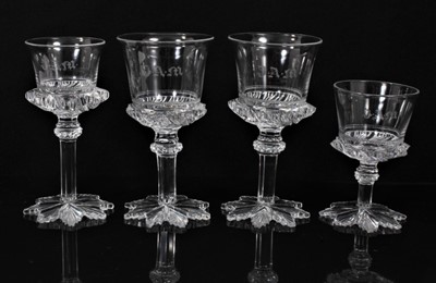 Lot 140 - Four William IV glasses with star cut foot