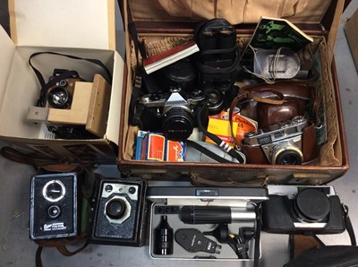 Lot 436 - Old leather suitcase containing vintage cameras and accessories