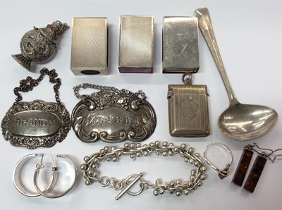 Lot 679 - Three silver matchbox holders, silver vesta case, Eastern white metal snuff bottle, two spirit labels, plated spoon and silver jewellery