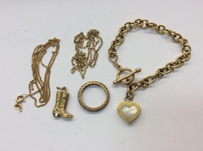 Lot 680 - 9ct gold gem set eternity ring, 9ct gold boot charm, two 9ct gold chains and yellow metal link bracelet with heart charm