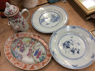 Lot 450 - Four pieces of Chinese porcelain, including an 18th century famille rose chocolate pot with cover, a famille rose platter c.1800, and two 18th century blue and white plates
