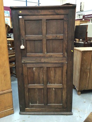 Lot 347 - Early 19th century oak two height corner cupboard with panelled doors 183 cm high, 96 cm wide