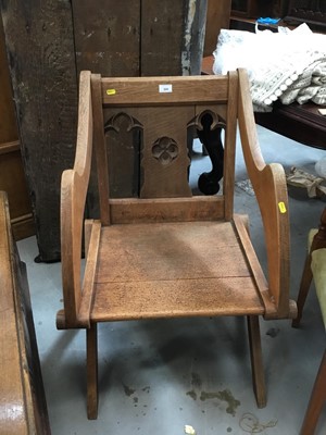 Lot 966 - Old Eclesiastical oak Gotic elbow chair on X frame