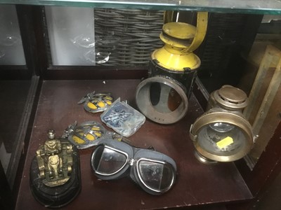 Lot 153 - Two miners lamps, motor racing goggles. Go-cart trophy, vintage AA, RAC badges