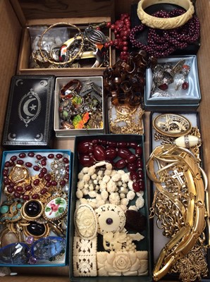 Lot 695 - 1920s carved and pierced ivory amethyst pendant, Victorian carved ivory brooch, two simulated cherry amber bead necklaces, vintage bead necklaces, vintage costume jewellery and wristwatches