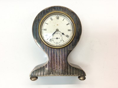 Lot 686 - 1920s silver cased time piece. 9cm high