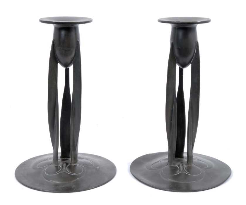 Lot 866 - Pair of Art Nouveau Liberty pewter candlesticks designed by Archibald Knox, model number 0223